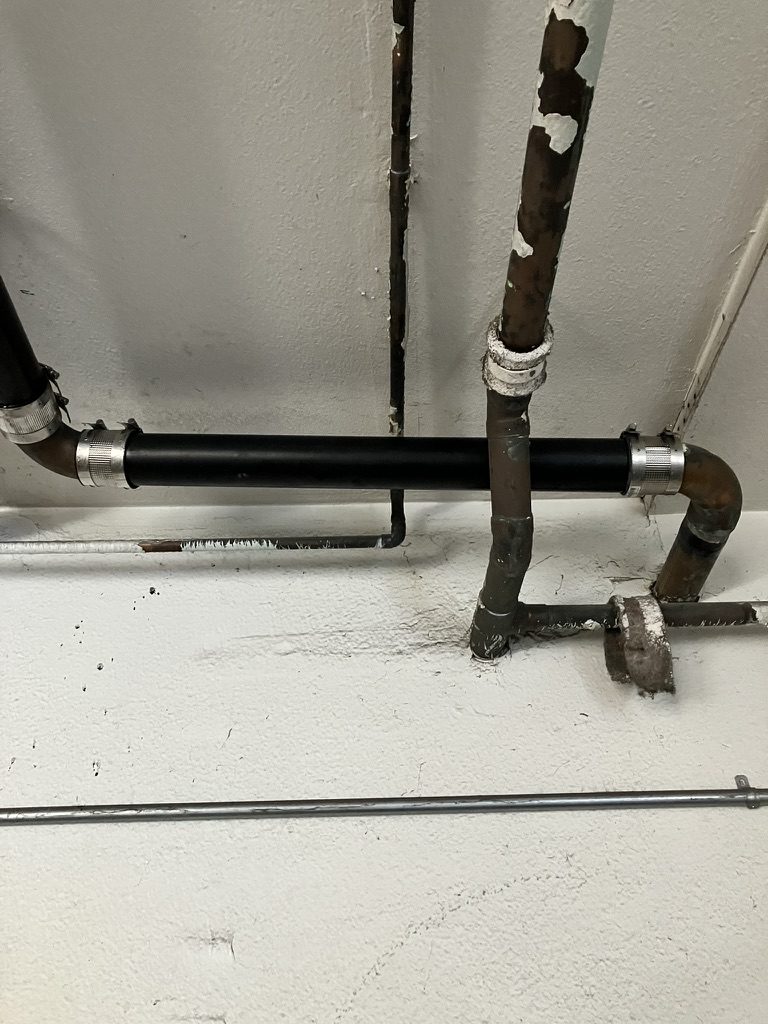 Copper section replaced with ABS and no-hub fittings
