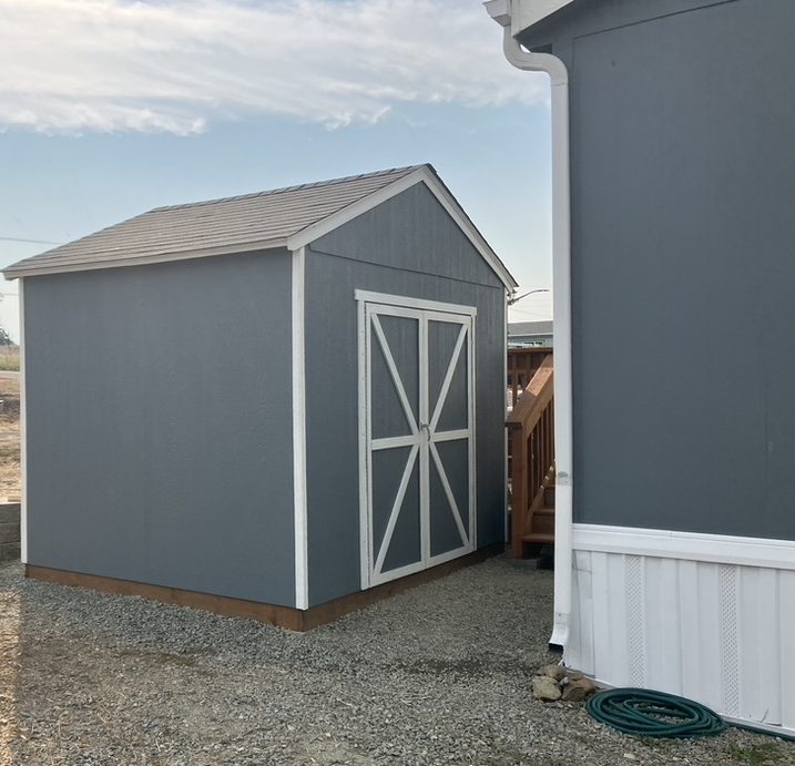 Finished shed kit painted to match the house