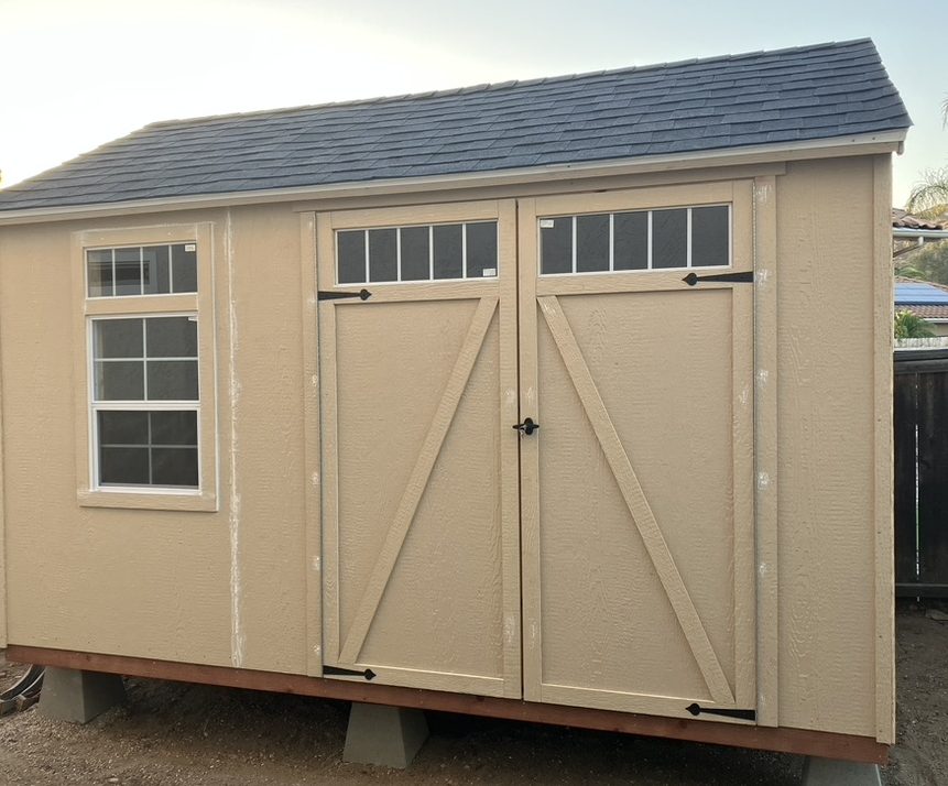 Finished tan shed with doors and window